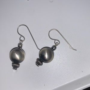 Authentic native American sterling, silver earrings.